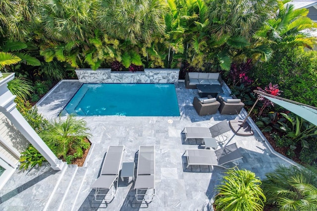 view of pool with a patio