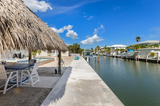 240 S Coconut Palm Blvd, Tavernier, FL 33070 - dock area with a water view and a patio area