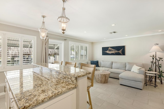 240 S Coconut Palm Blvd, Tavernier, FL 33070 - living area featuring crown molding, recessed lighting, and light tile patterned flooring