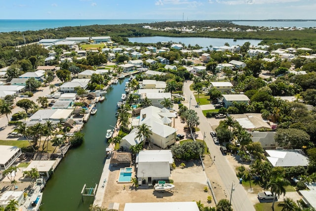 240 S Coconut Palm Blvd, Tavernier, FL 33070 - aerial view of property and surrounding area featuring a large body of water and nearby suburban area