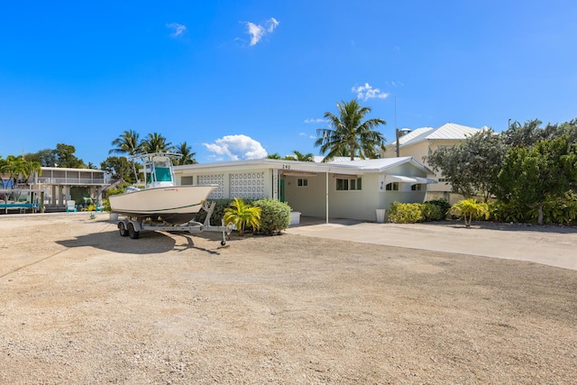 240 S Coconut Palm Blvd, Tavernier, FL 33070 - view of front of home with an attached carport and driveway