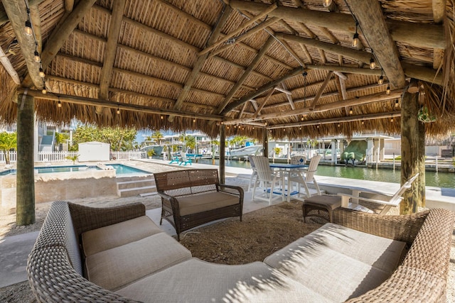240 S Coconut Palm Blvd, Tavernier, FL 33070 - view of patio / terrace featuring a water view, a gazebo, and a storage shed