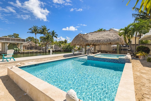 240 S Coconut Palm Blvd, Tavernier, FL 33070 - view of pool with a gazebo, a pool with connected hot tub, a water view, and a patio