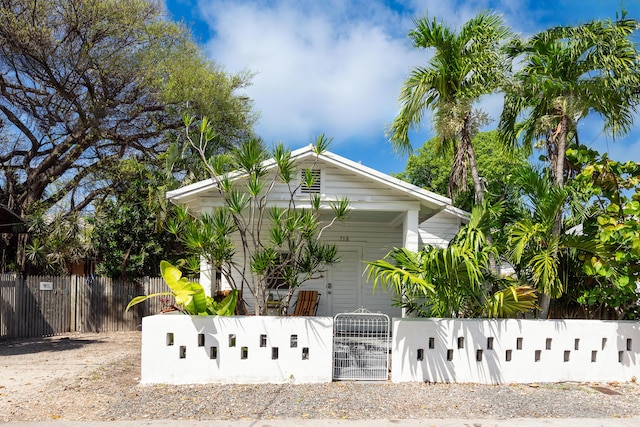 718 Chapman Ln, Key West, FL 33040 - view of side of home with a fenced front yard