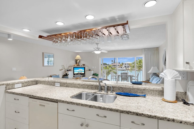 95 Coco Plum Dr Unit 2D, Marathon, FL 33050 - kitchen with dishwasher, a sink, white cabinets, recessed lighting, and ceiling fan