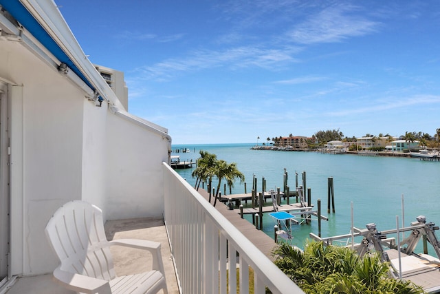 95 Coco Plum Dr Unit 2D, Marathon, FL 33050 - balcony with a water view, a dock, and boat lift