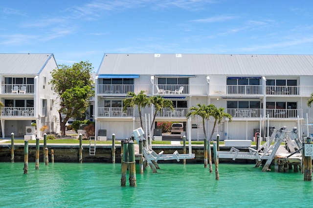 95 Coco Plum Dr Unit 2D, Marathon, FL 33050 - dock area featuring a water view