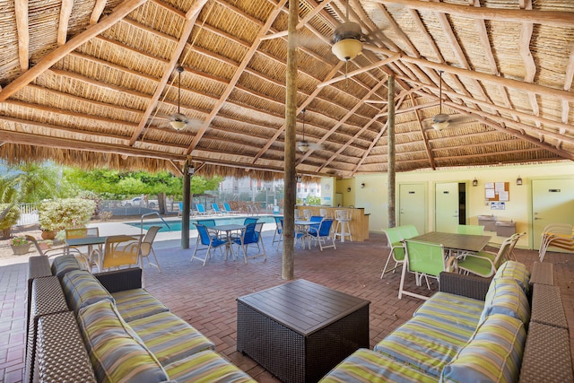 95 Coco Plum Dr Unit 2D, Marathon, FL 33050 - view of patio / terrace featuring a gazebo, ceiling fan, outdoor dining space, and fence