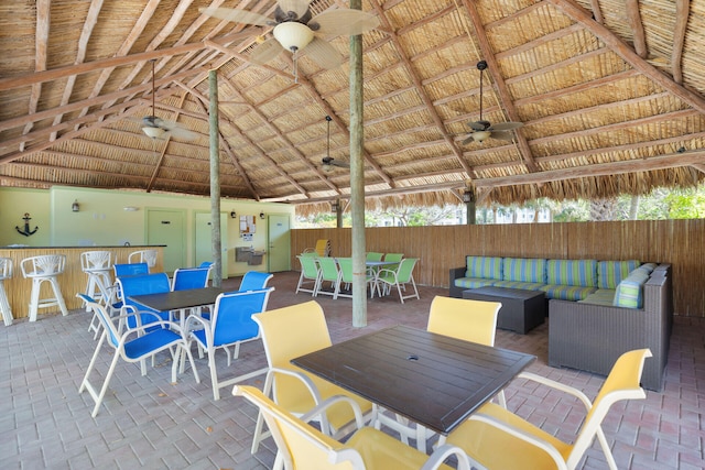 95 Coco Plum Dr Unit 2D, Marathon, FL 33050 - view of patio / terrace featuring a gazebo, a ceiling fan, and outdoor dining area