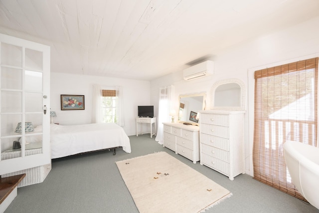 carpeted bedroom featuring wood ceiling and a wall mounted air conditioner