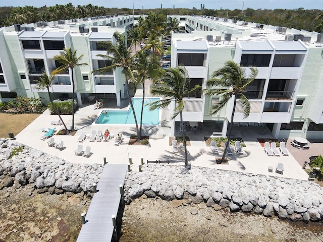 view of property with a community pool