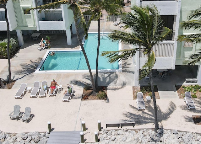 view of pool featuring a patio area