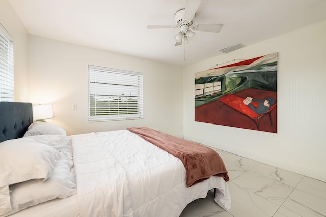 bedroom featuring ceiling fan