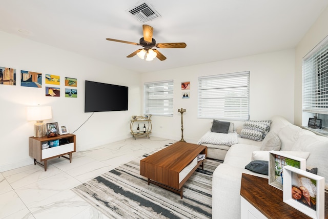 living room featuring ceiling fan