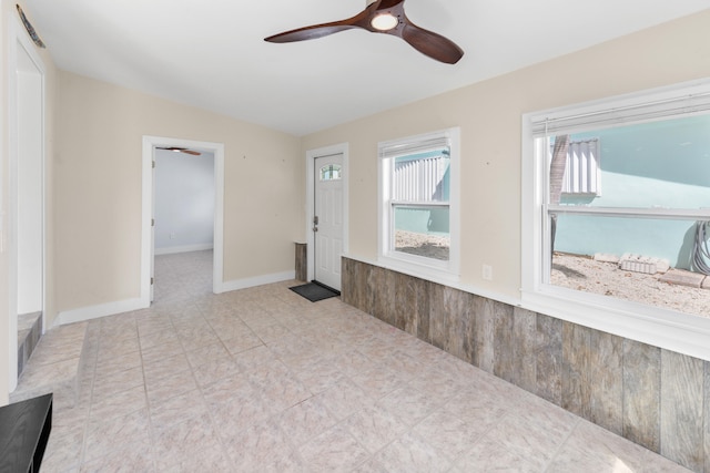 empty room featuring ceiling fan