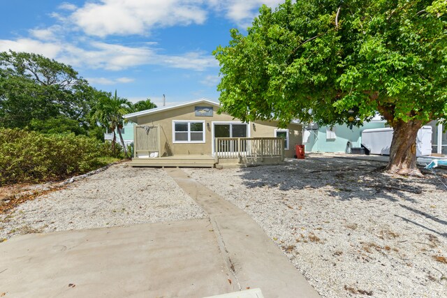 view of front of home with a deck