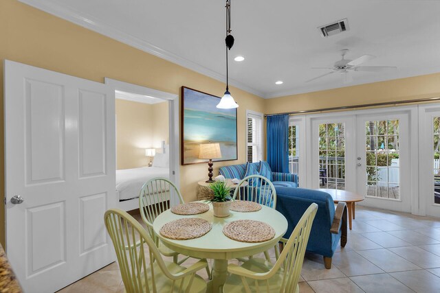 2600 Overseas Hwy Unit 25, Marathon, FL 33050 - dining area with ornamental molding, light tile patterned floors, ceiling fan, recessed lighting, and french doors