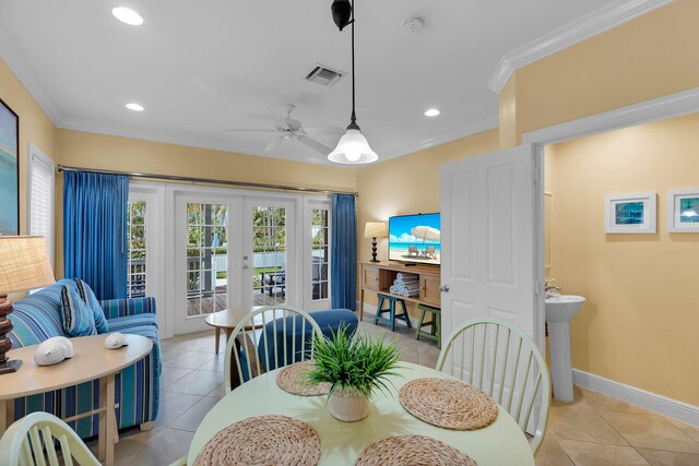2600 Overseas Hwy Unit 25, Marathon, FL 33050 - dining area featuring french doors, crown molding, light tile patterned floors, ceiling fan, and recessed lighting