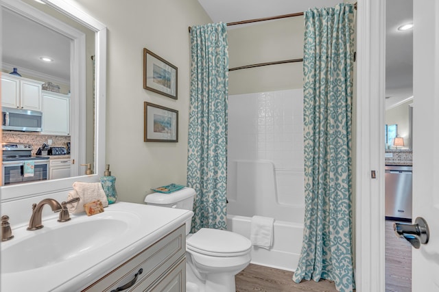 full bathroom with toilet, crown molding, shower / tub combo, vanity, and hardwood / wood-style flooring