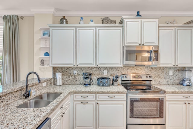 kitchen featuring sink, ornamental molding, appliances with stainless steel finishes, light stone countertops, and backsplash