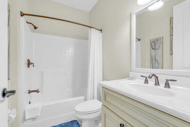 full bathroom featuring toilet, vanity, and shower / bathtub combination with curtain