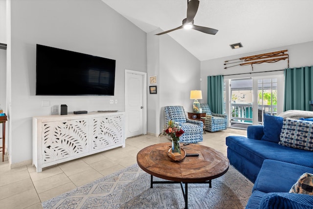 living area featuring visible vents, baseboards, light tile patterned flooring, and a ceiling fan