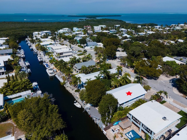 bird's eye view with a water view and a residential view