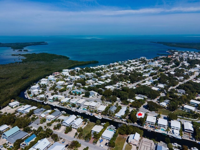 bird's eye view with a residential view and a water view