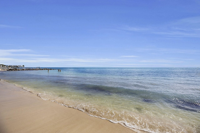 property view of water featuring a view of the beach