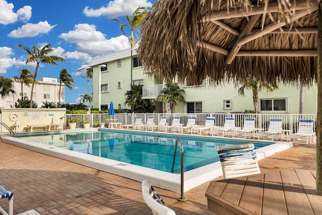 view of swimming pool featuring a patio area