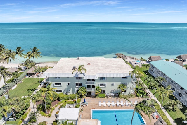 drone / aerial view with a view of the beach and a water view