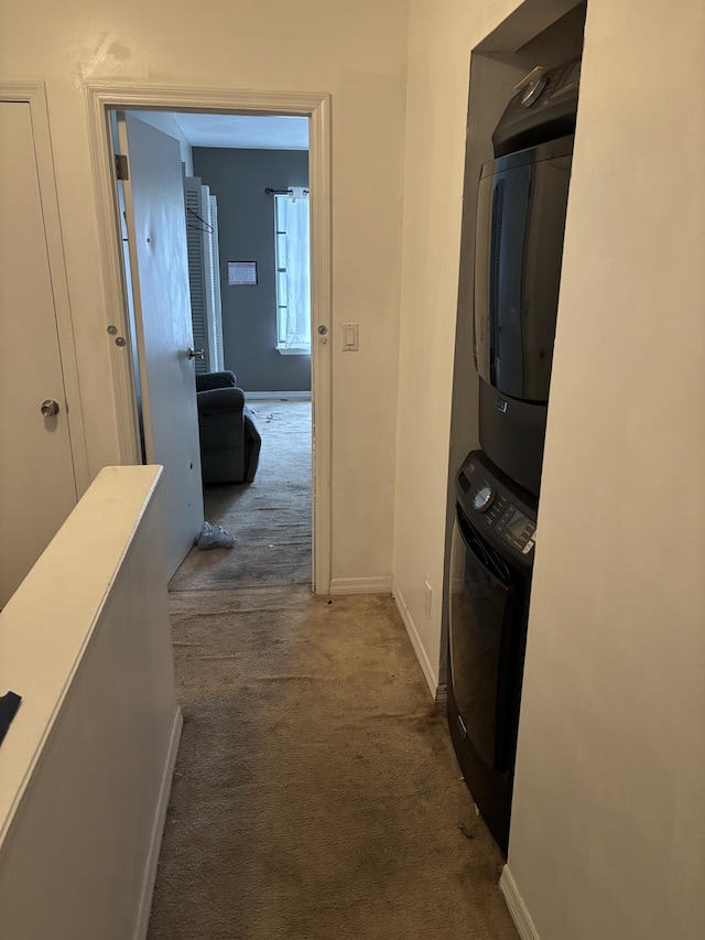 3314 Northside Dr Unit 46, Key West, FL 33040 - hall featuring stacked washing machine and dryer and dark colored carpet