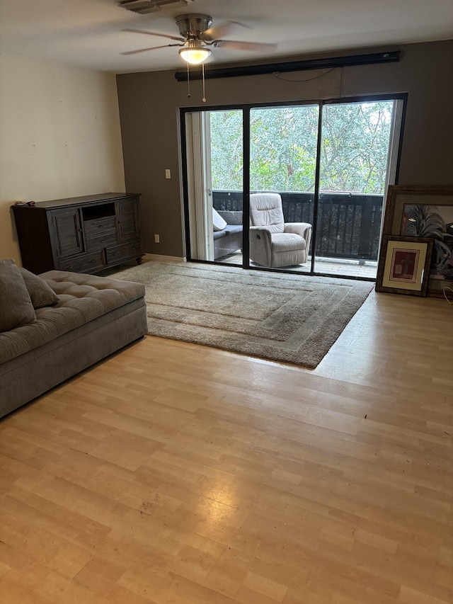 3314 Northside Dr Unit 46, Key West, FL 33040 - living area with plenty of natural light, a ceiling fan, and wood finished floors