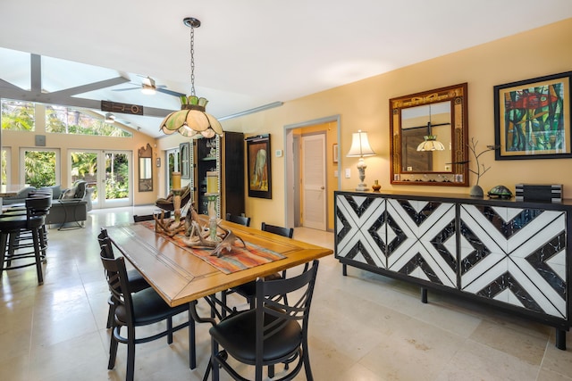 dining room with lofted ceiling and ceiling fan