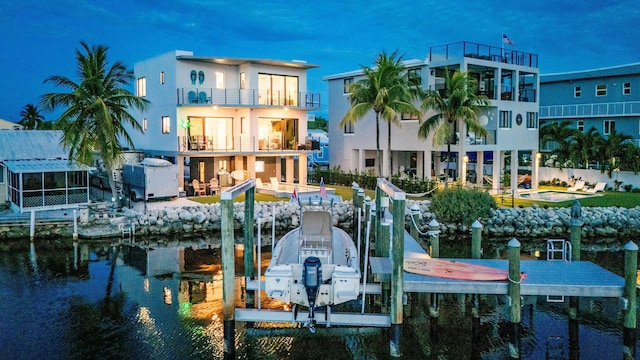 34 Bunting Dr, Key Largo, FL 33037 - dock with boat lift, a balcony, and a water view