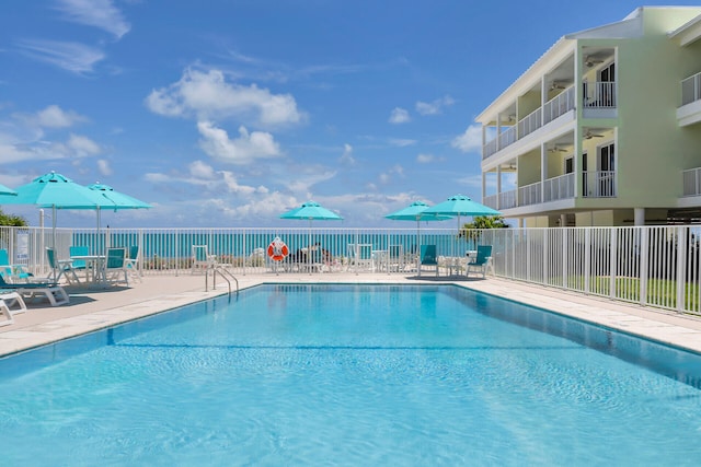 501 E Ocean Dr Unit 17, Key Colony, FL 33051 - community pool featuring ceiling fan and a patio