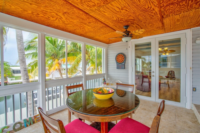 sunroom / solarium with french doors, ceiling fan, and wooden ceiling