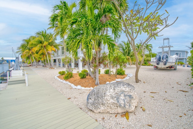 view of property's community with a dock