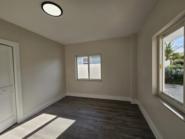 392 Laguna Ave, Key Largo, FL 33037 - spare room with dark wood-type flooring and baseboards