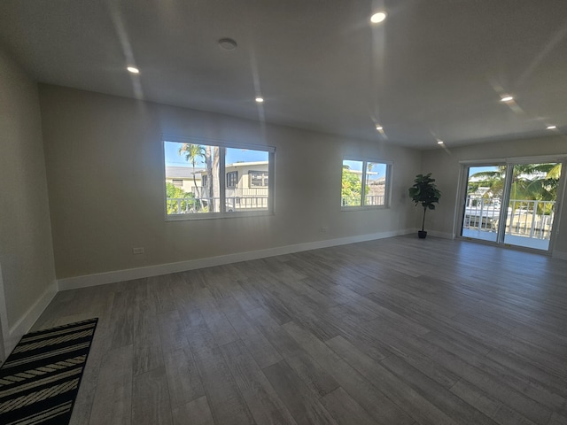 392 Laguna Ave, Key Largo, FL 33037 - empty room featuring wood finished floors, baseboards, and recessed lighting