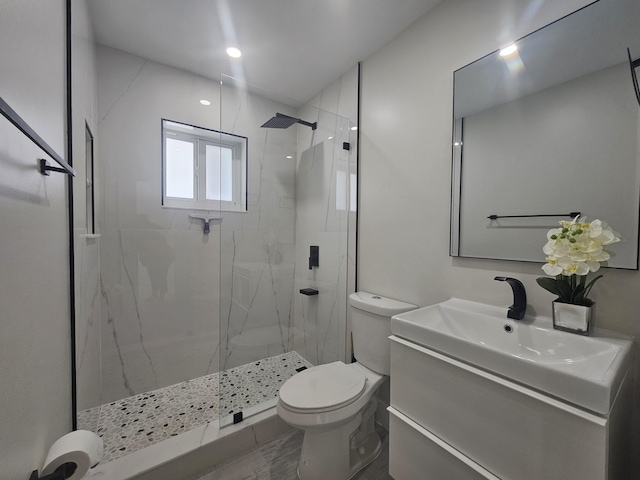 392 Laguna Ave, Key Largo, FL 33037 - bathroom with toilet, a marble finish shower, and vanity