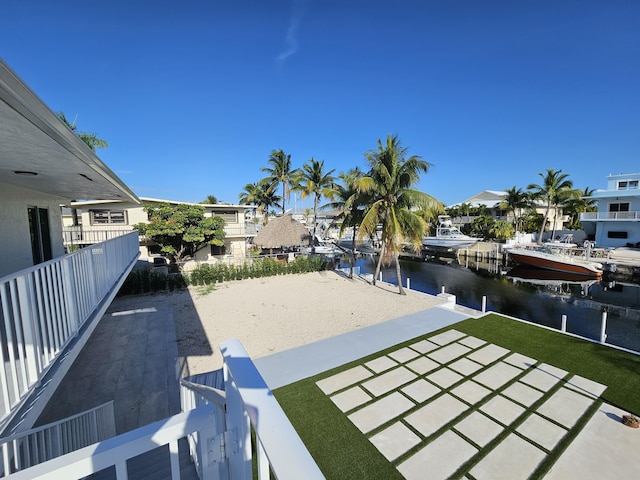 392 Laguna Ave, Key Largo, FL 33037 - view of home's community with a water view, a boat dock, boat lift, and a patio