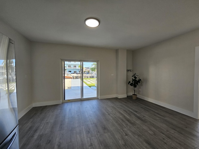 392 Laguna Ave, Key Largo, FL 33037 - unfurnished room with dark wood-style flooring and baseboards