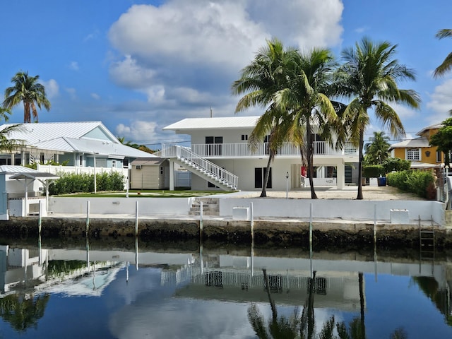 392 Laguna Ave, Key Largo, FL 33037 - rear view of property with a water view and stairway