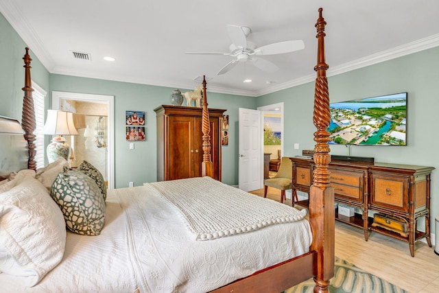 bedroom with crown molding, ensuite bath, and ceiling fan