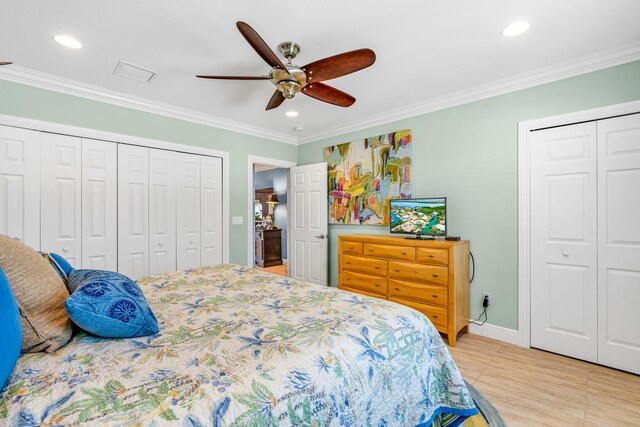 tiled bedroom featuring ornamental molding and ceiling fan