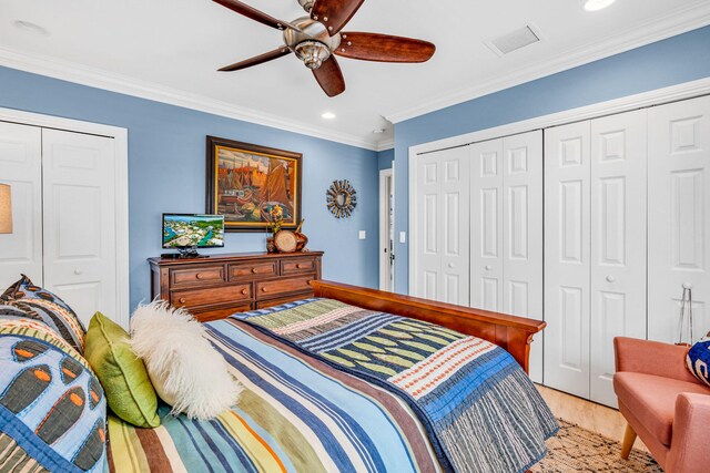 bedroom with crown molding, ceiling fan, and light hardwood / wood-style flooring