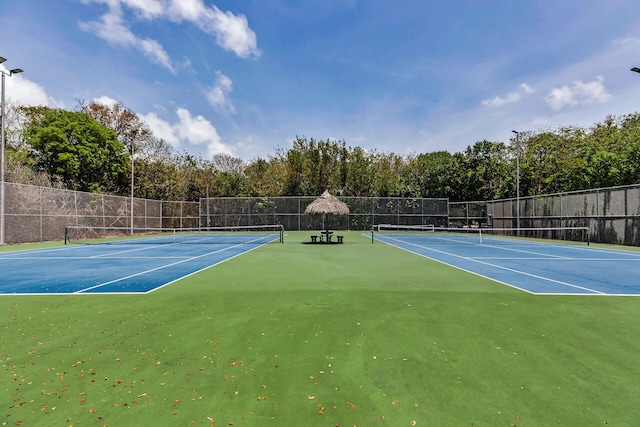 87851 Old Hwy Unit K26, Islamorada, FL 33036 - view of tennis court featuring community basketball court