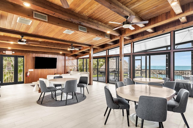 87851 Old Hwy Unit K26, Islamorada, FL 33036 - sunroom featuring a water view and beamed ceiling