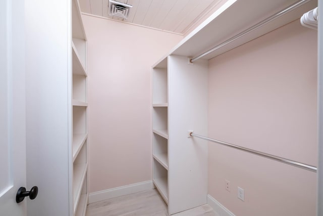 walk in closet featuring light wood-type flooring